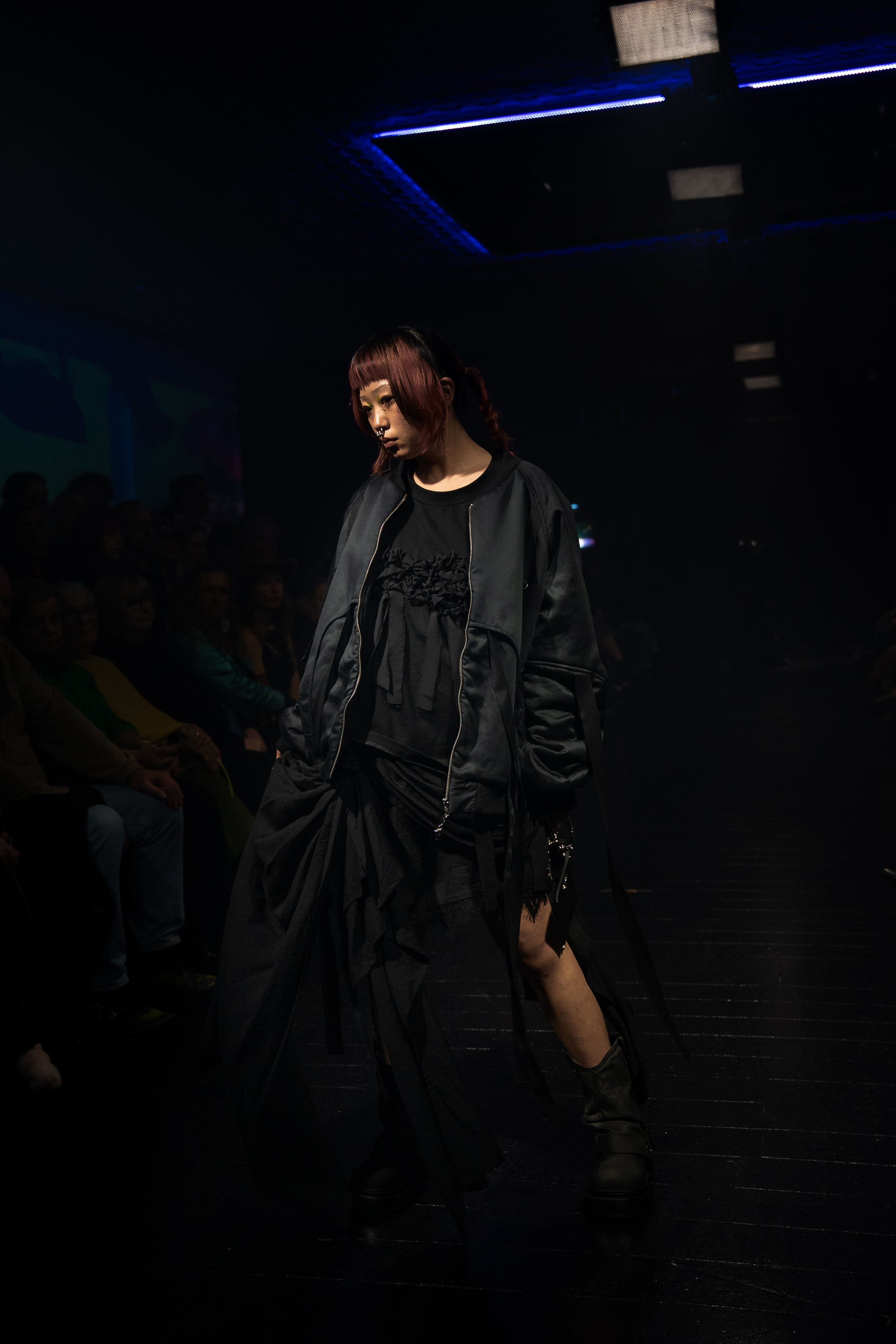 Model wearing a Rhian outfit on runway in Auckland